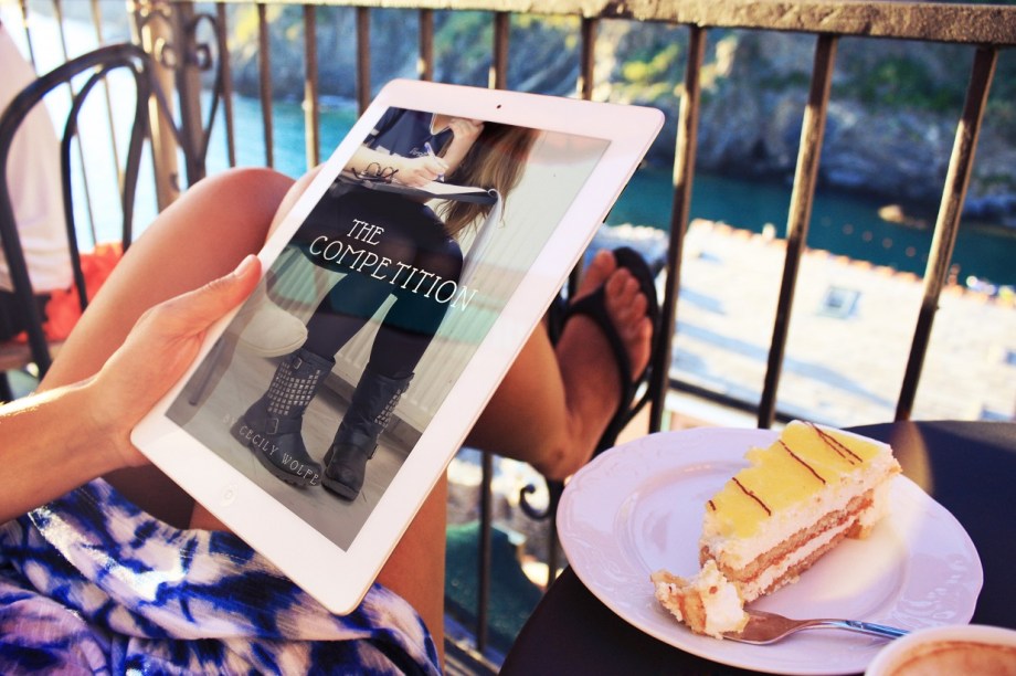 The Competition on tablet being read